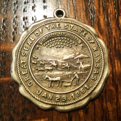 14k gold-plated Great Seal of Kansas medallion, found by Terry R.