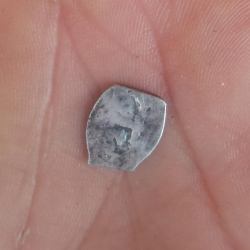 Silver macuquina coin, found by Luciano S.