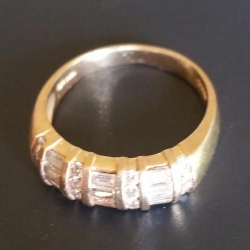 14k gold ring with 16 diamonds, found by Glenn W.