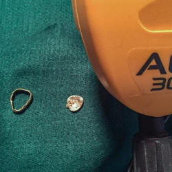 14k gold ring and a silver charm, found by Charles F.