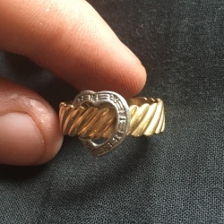 Gold ring with silver heart, found by Andrew T.