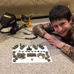 Collin B. poses with his ACE 300 finds.