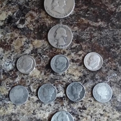 10 silver coins found in one yard, found by James W.