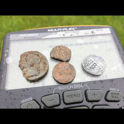 Charles the 2nd 1685, two Roman coins, and Edward the 1st silver hammered coin found by Harry M. from the United Kingdom