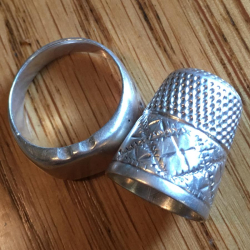 Silver ring and thimble, found by Jeff H.